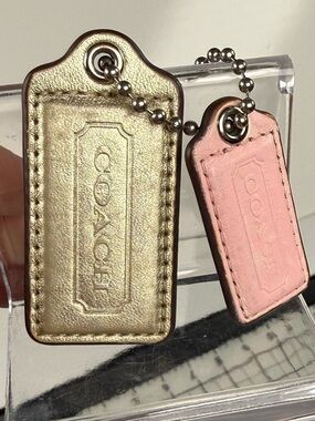 COACH Gold and Blush Leather Tag Key Fob Set